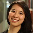 Child and parent using PicSeePal communication board together