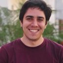 Child and parent using PicSeePal communication board together